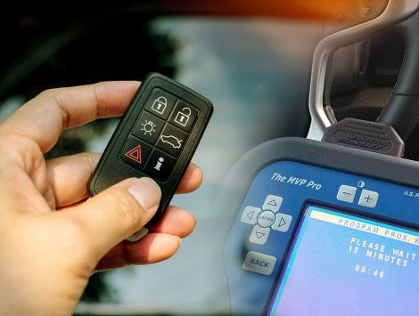 AAA&B Locksmith LLC technician programming a smart car key in Waterbury, CT.